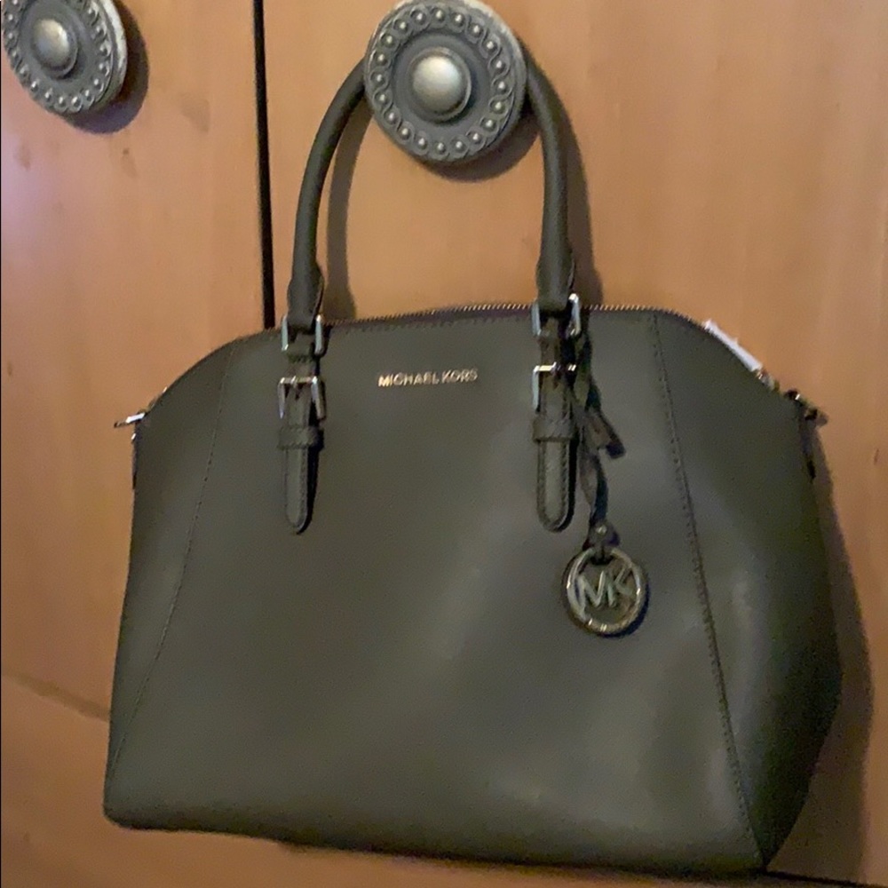 Handbag, wallet, and makeup bag.